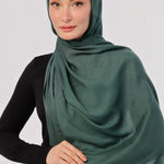 Bottle Green Modal Hijab - worn by model, lightweight and flowy drape.