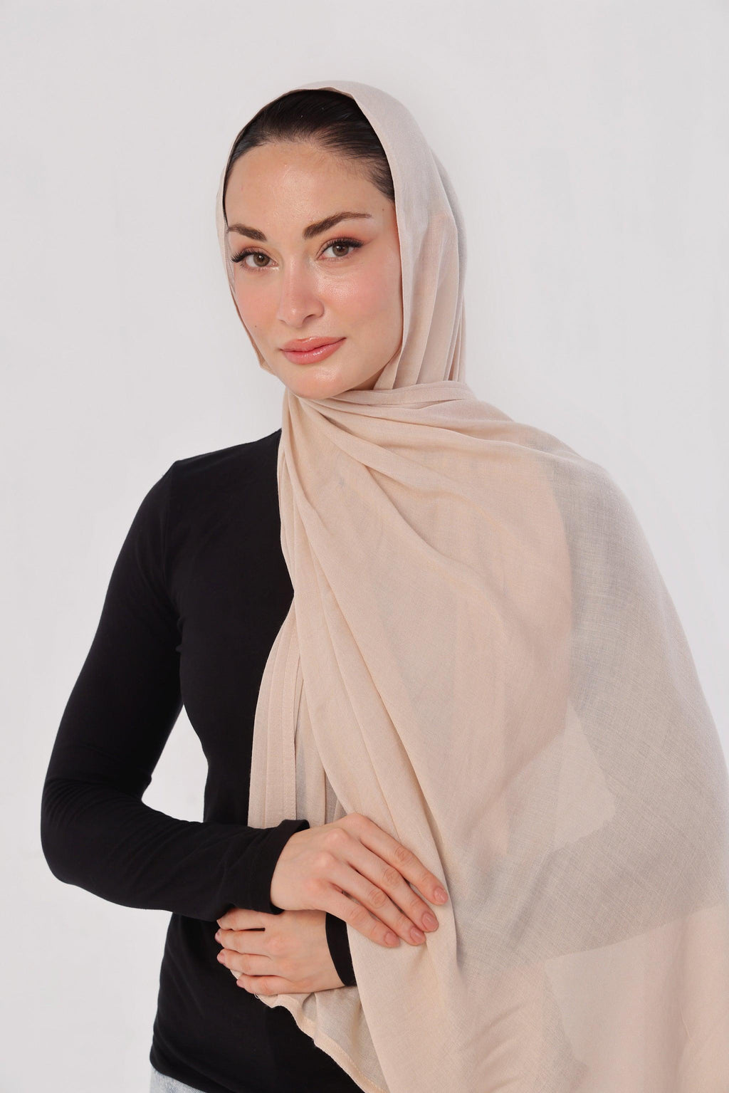 Ivory Nude Modal Hijab - worn by model, lightweight and flowy drape.