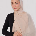 Ivory Nude Modal Hijab - worn by model, lightweight and flowy drape.