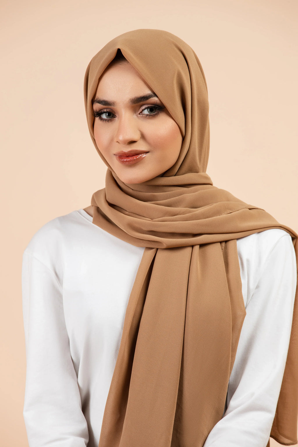 Premium Georgette - Almond Georgette Hijab worn by model, lightweight and flowy drape.