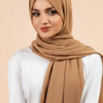 Premium Georgette - Almond Georgette Hijab worn by model, lightweight and flowy drape.