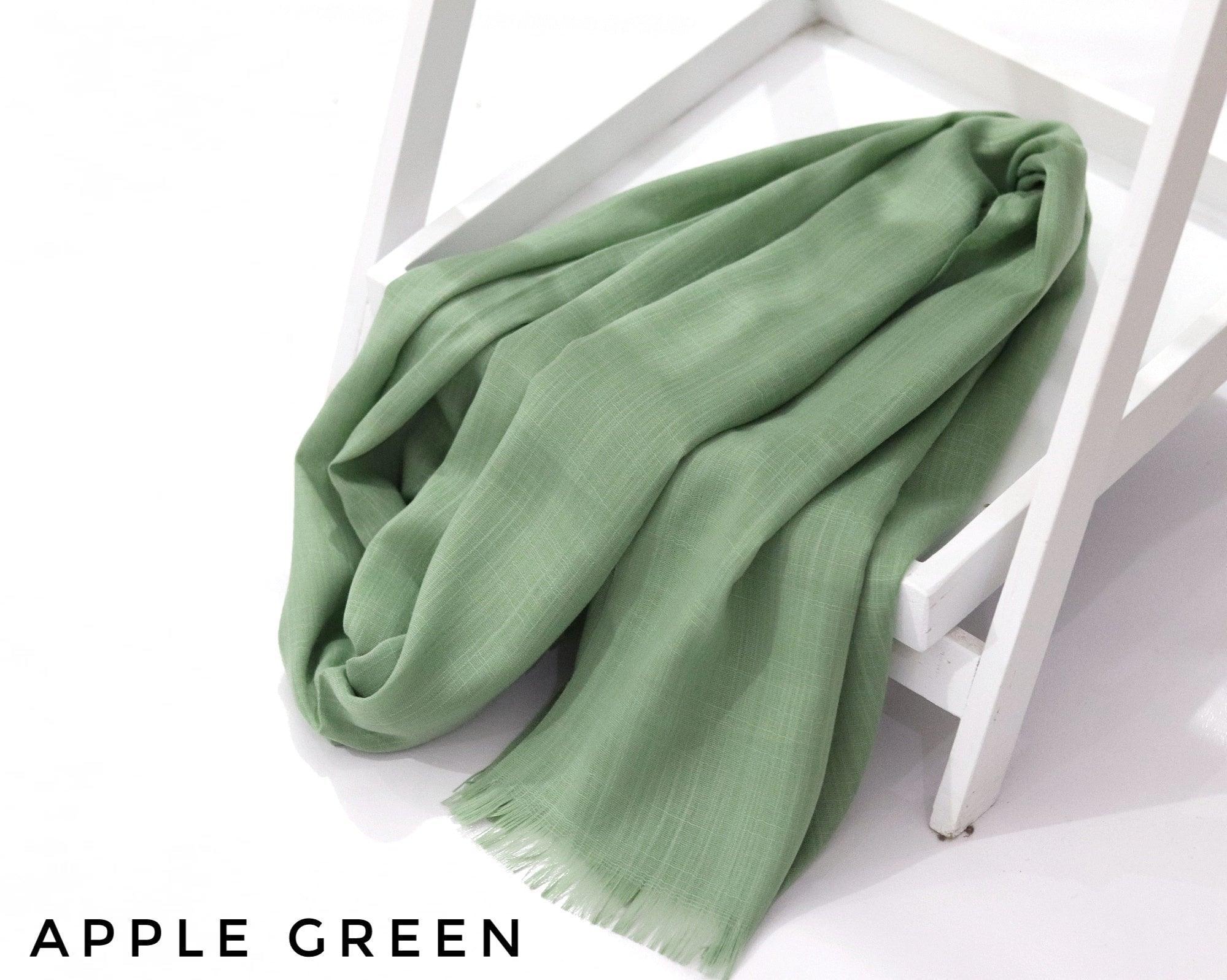 Apple Green Turkish Viscose Hijab close-up of smooth Turkish viscose texture.