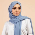 Premium Georgette - Baby Blue Georgette Hijab worn by model, lightweight and flowy drape.