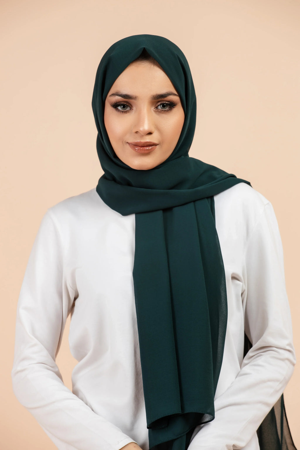 Premium Georgette - Bottle Green Georgette Hijab worn by model, lightweight and flowy drape.