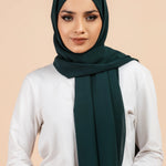 Premium Georgette - Bottle Green Georgette Hijab worn by model, lightweight and flowy drape.