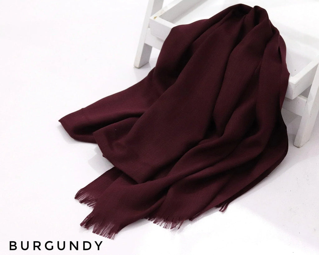 Burgundy Turkish Viscose Hijab close-up of smooth Turkish viscose texture.