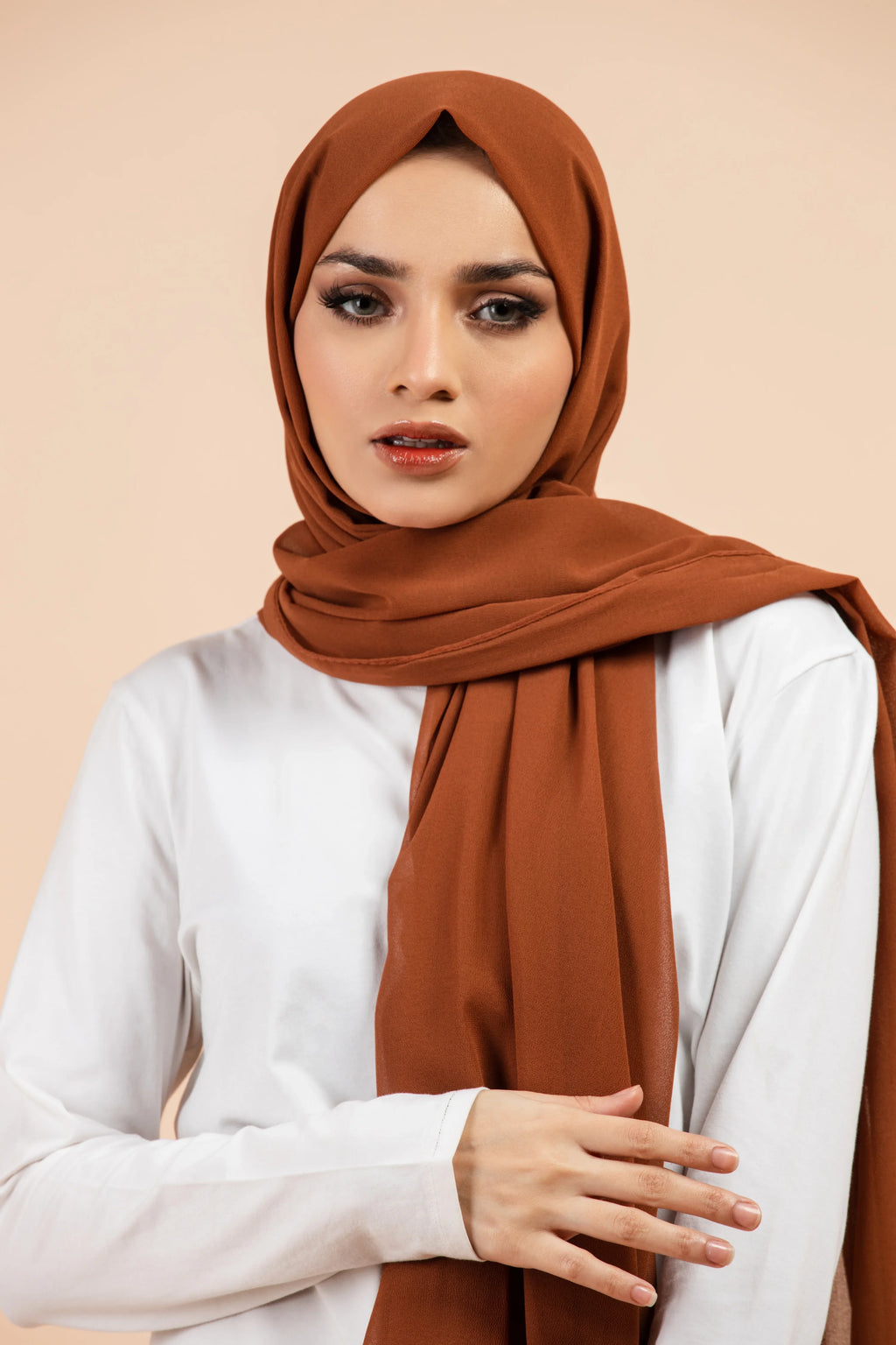 Premium Georgette - Caramel Georgette Hijab worn by model, lightweight and flowy drape.
