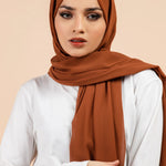 Premium Georgette - Caramel Georgette Hijab worn by model, lightweight and flowy drape.