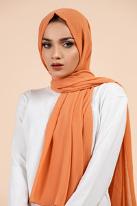 Premium Georgette - Coral Bliss Georgette Hijab worn by model, lightweight and flowy drape.