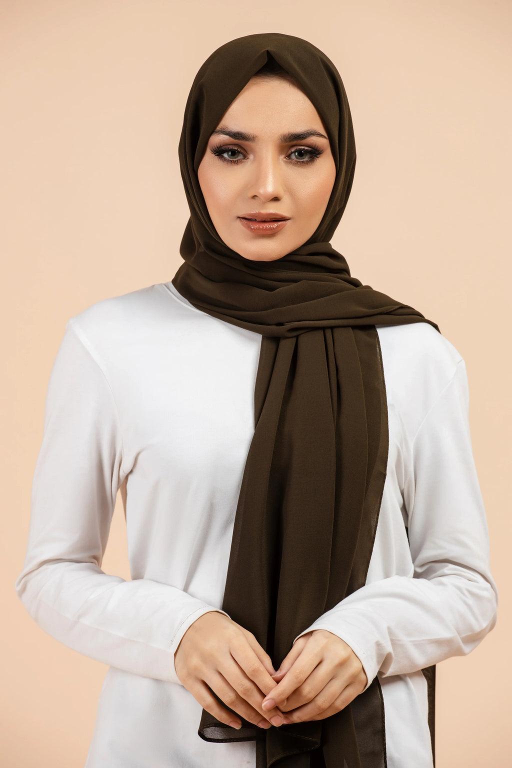 Premium Georgette - Deep Olive Georgette Hijab worn by model, lightweight and flowy drape.