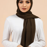Premium Georgette - Deep Olive Georgette Hijab worn by model, lightweight and flowy drape.