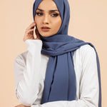 Premium Georgette - Demin Blue Georgette Hijab worn by model, lightweight and flowy drape.