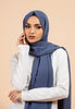 Premium Georgette - Demin Blue Georgette Hijab worn by model, lightweight and flowy drape.