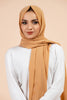 Premium Georgette - Golden Beige Georgette Hijab worn by model, lightweight and flowy drape.