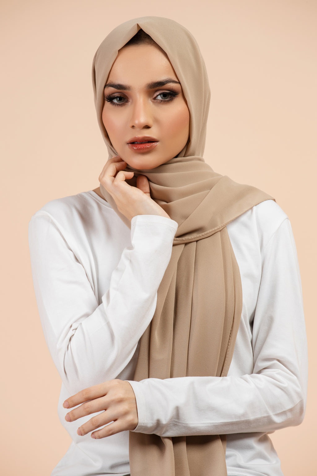 Premium Georgette - Khaki Georgette Hijab worn by model, lightweight and flowy drape.