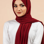 Premium Georgette - Maroon Georgette Hijab worn by model, lightweight and flowy drape.