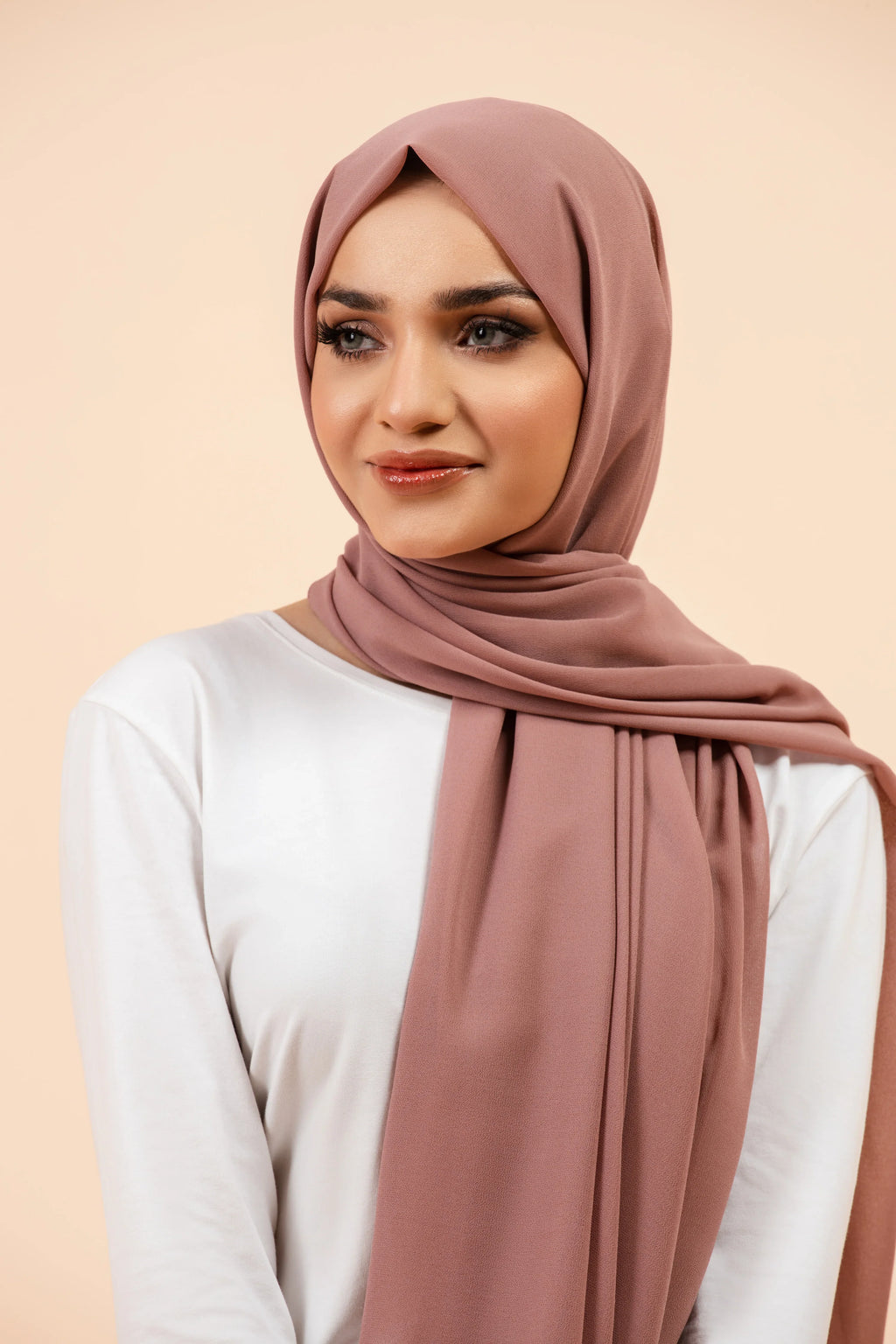 Premium Georgette - Mauve Georgette Hijab worn by model, lightweight and flowy drape.