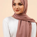 Premium Georgette - Mauve Georgette Hijab worn by model, lightweight and flowy drape.
