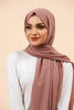 Premium Georgette - Mauve Georgette Hijab worn by model, lightweight and flowy drape.