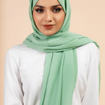 Premium Georgette - Mint Georgette Hijab worn by model, lightweight and flowy drape.