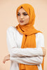 Premium Georgette - Mustard Georgette Hijab worn by model, lightweight and flowy drape.