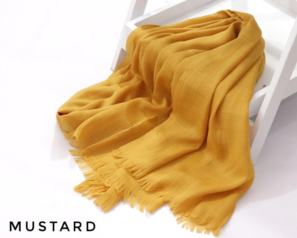 Mustard Turkish Viscose Hijab close-up of smooth Turkish viscose texture.