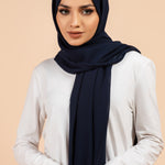 Premium Georgette - Navy Blue Georgette Hijab worn by model, lightweight and flowy drape.