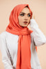 Premium Georgette - Neon Peach Georgette Hijab worn by model, lightweight and flowy drape.