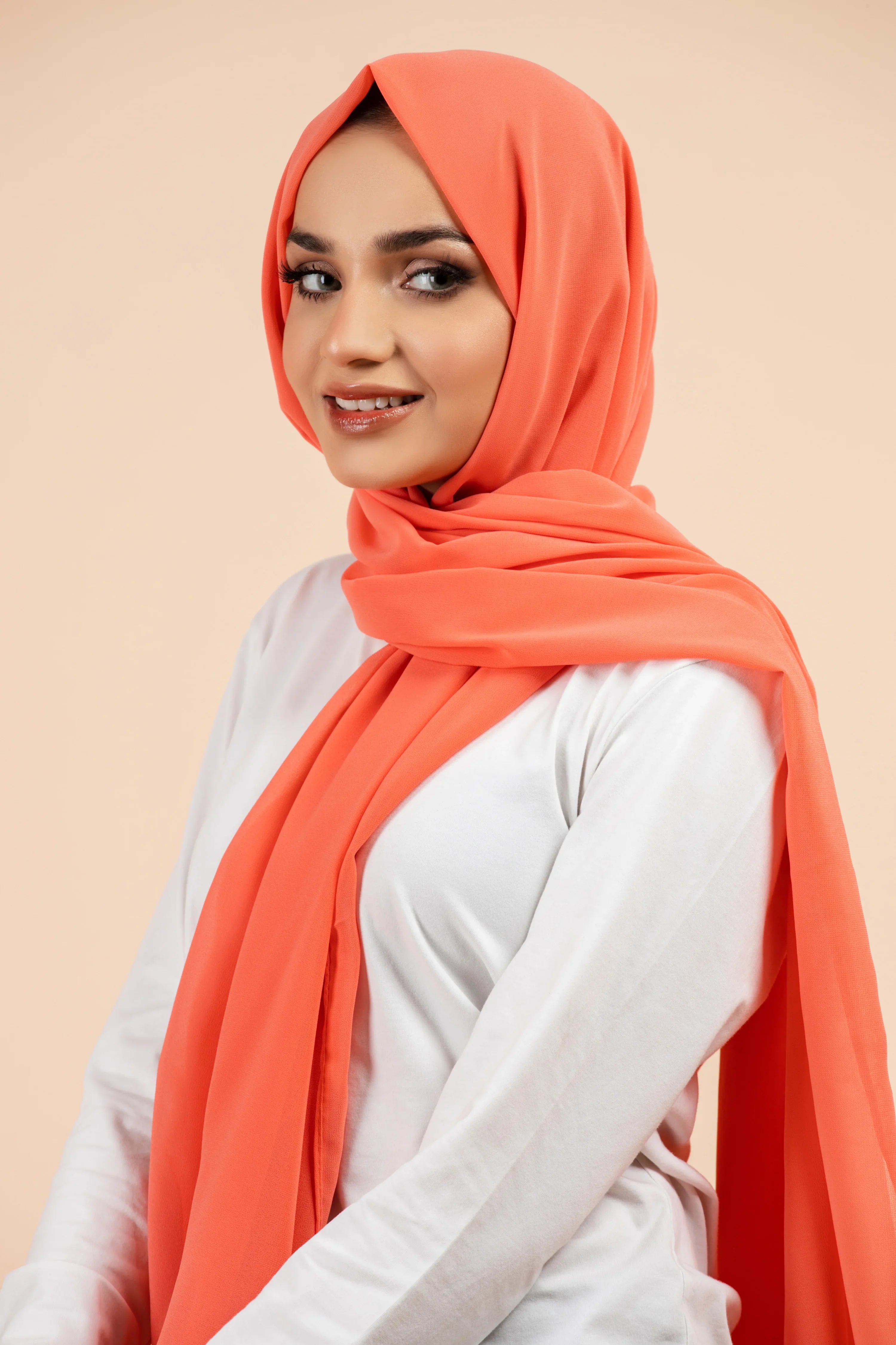 Premium Georgette - Neon Peach Georgette Hijab close-up of smooth georgette fabric texture.