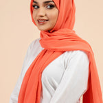 Premium Georgette - Neon Peach Georgette Hijab close-up of smooth georgette fabric texture.