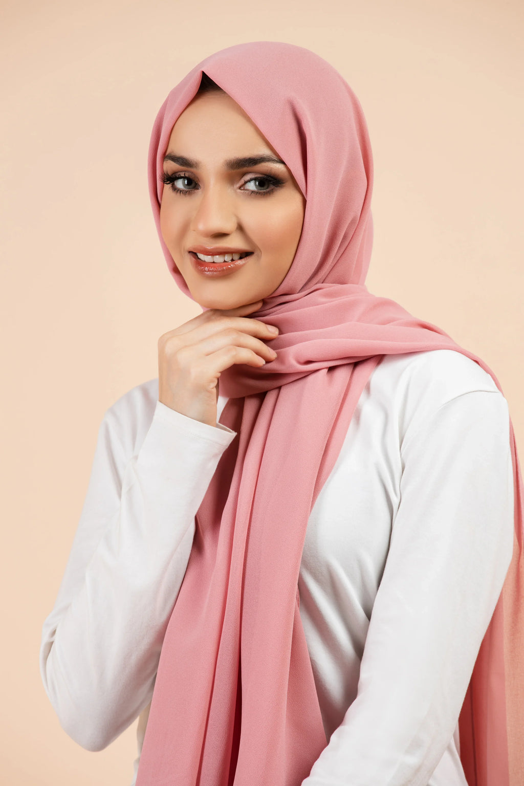Premium Georgette - Nude Pink Georgette Hijab worn by model, lightweight and flowy drape.
