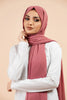 Premium Georgette - Orchid Georgette Hijab worn by model, lightweight and flowy drape.