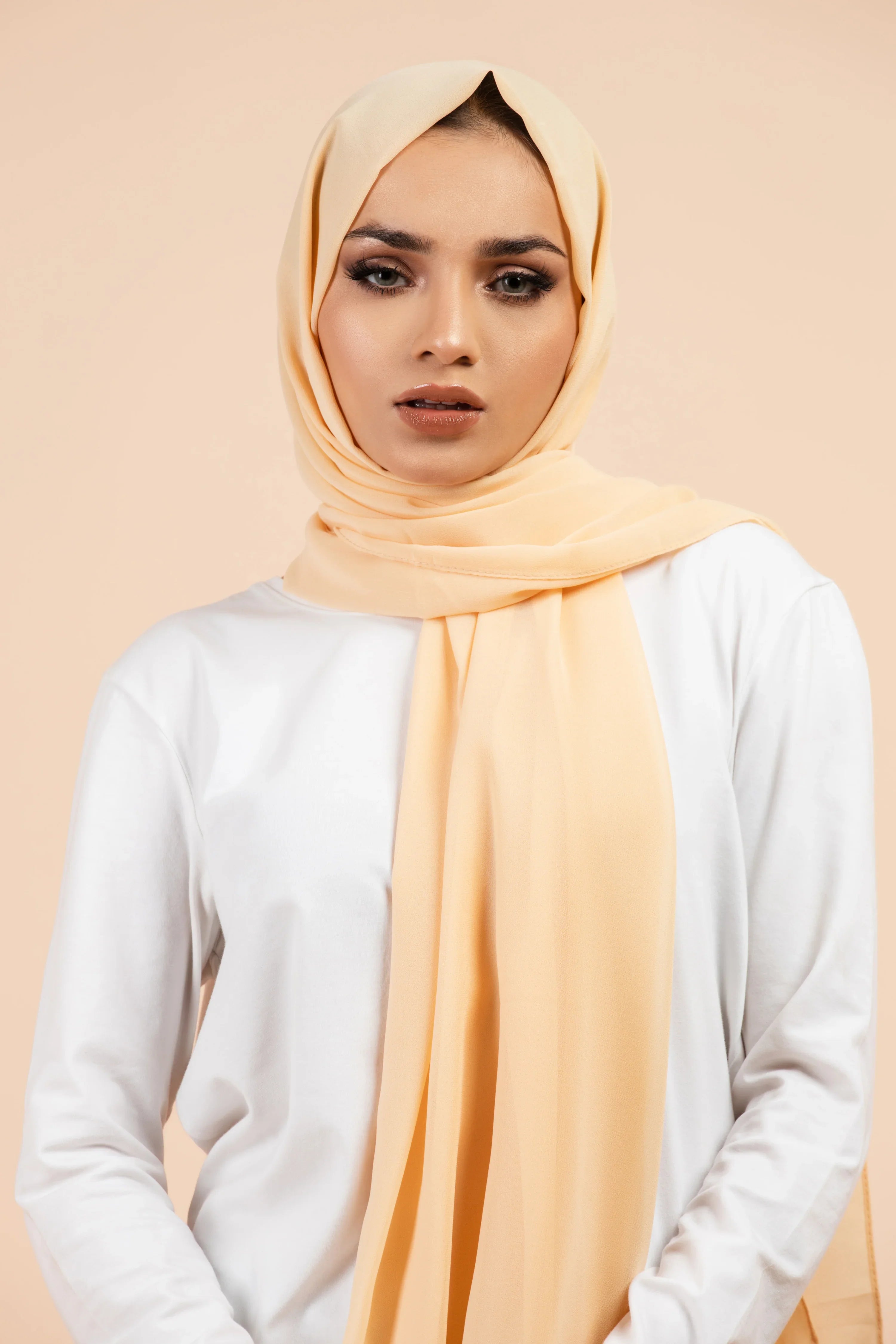 Premium Georgette - Pancake Georgette Hijab worn by model, lightweight and flowy drape.