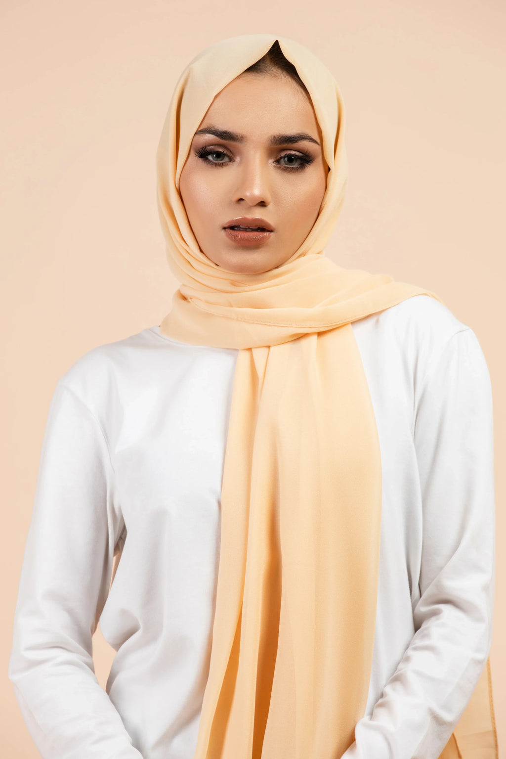 Premium Georgette - Pancake Georgette Hijab worn by model, lightweight and flowy drape.