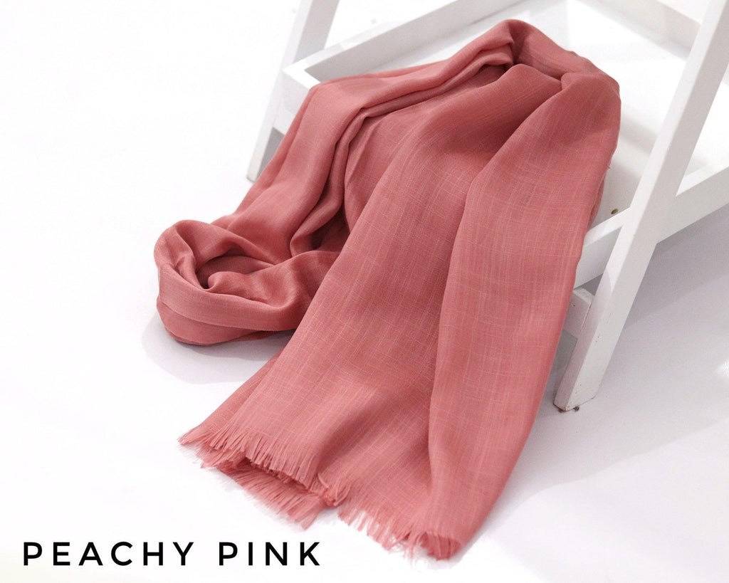Peachy Pink Turkish Viscose Hijab close-up of smooth Turkish viscose texture.