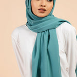 Premium Georgette - Peacock Georgette Hijab worn by model, lightweight and flowy drape.
