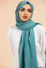 Premium Georgette - Peacock Georgette Hijab worn by model, lightweight and flowy drape.