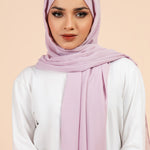 Premium Georgette - Periwinkle Georgette Hijab worn by model, lightweight and flowy drape.
