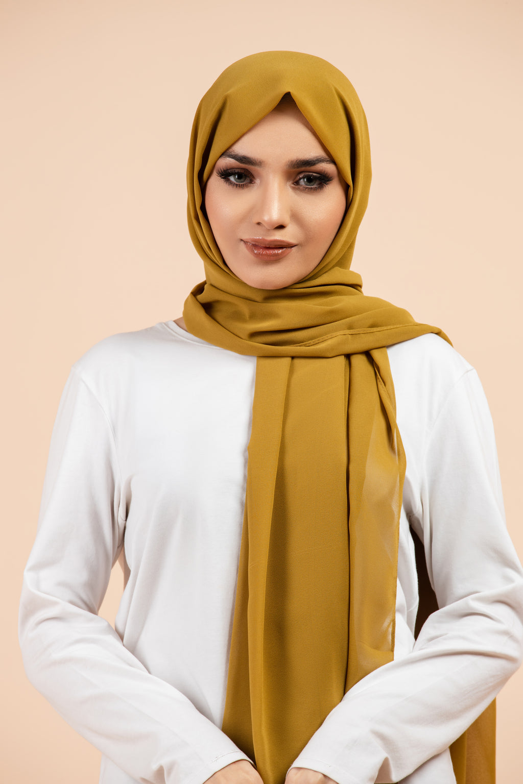 Premium Georgette - Pickle Georgette Hijab worn by model, lightweight and flowy drape.