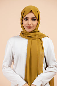 Premium Georgette - Pickle Georgette Hijab worn by model, lightweight and flowy drape.