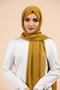 Premium Georgette - Pickle Georgette Hijab worn by model, lightweight and flowy drape.