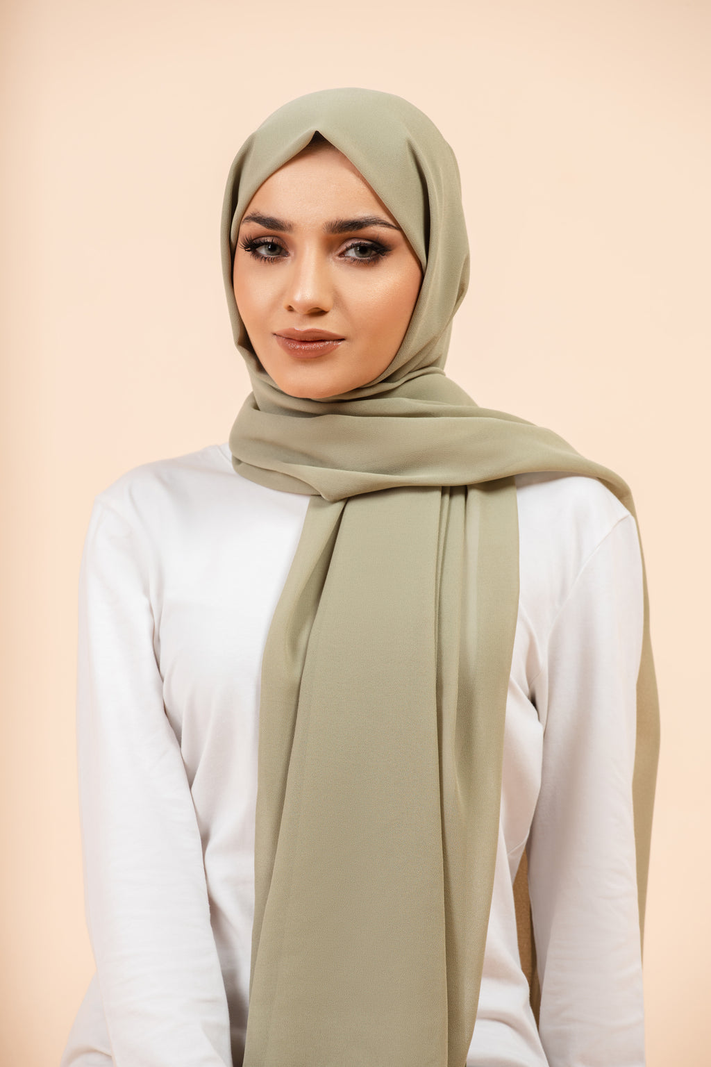 Premium Georgette - Pistachio Georgette Hijab worn by model, lightweight and flowy drape.