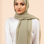 Premium Georgette - Pistachio Georgette Hijab worn by model, lightweight and flowy drape.