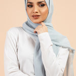 Premium Georgette - Powder Blue Georgette Hijab worn by model, lightweight and flowy drape.
