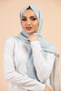 Premium Georgette - Powder Blue Georgette Hijab worn by model, lightweight and flowy drape.
