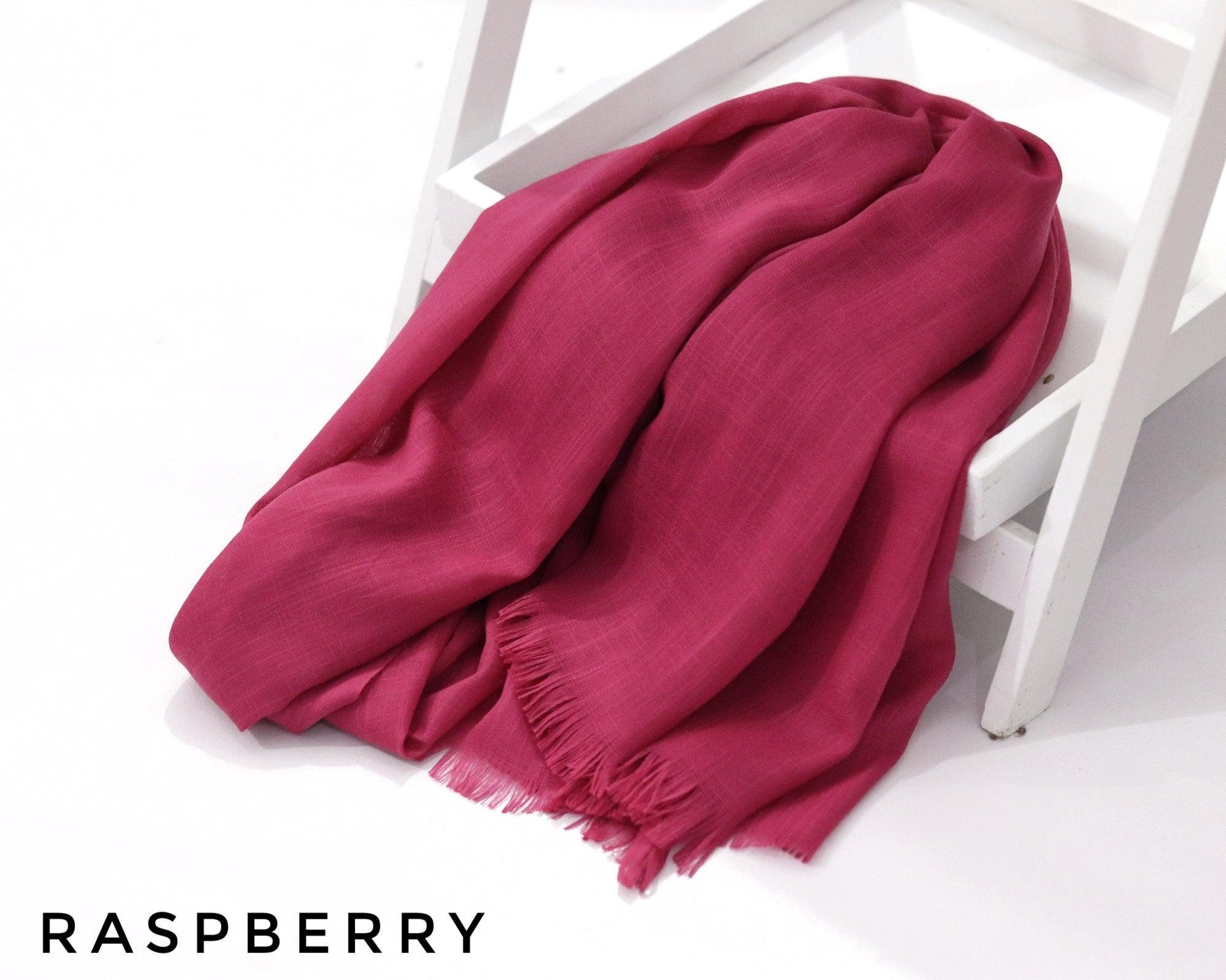 Raspberry Turkish Viscose Hijab close-up of smooth Turkish viscose texture.