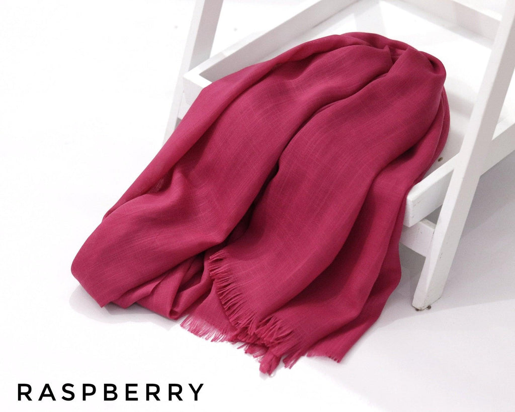 Raspberry Turkish Viscose Hijab close-up of smooth Turkish viscose texture.