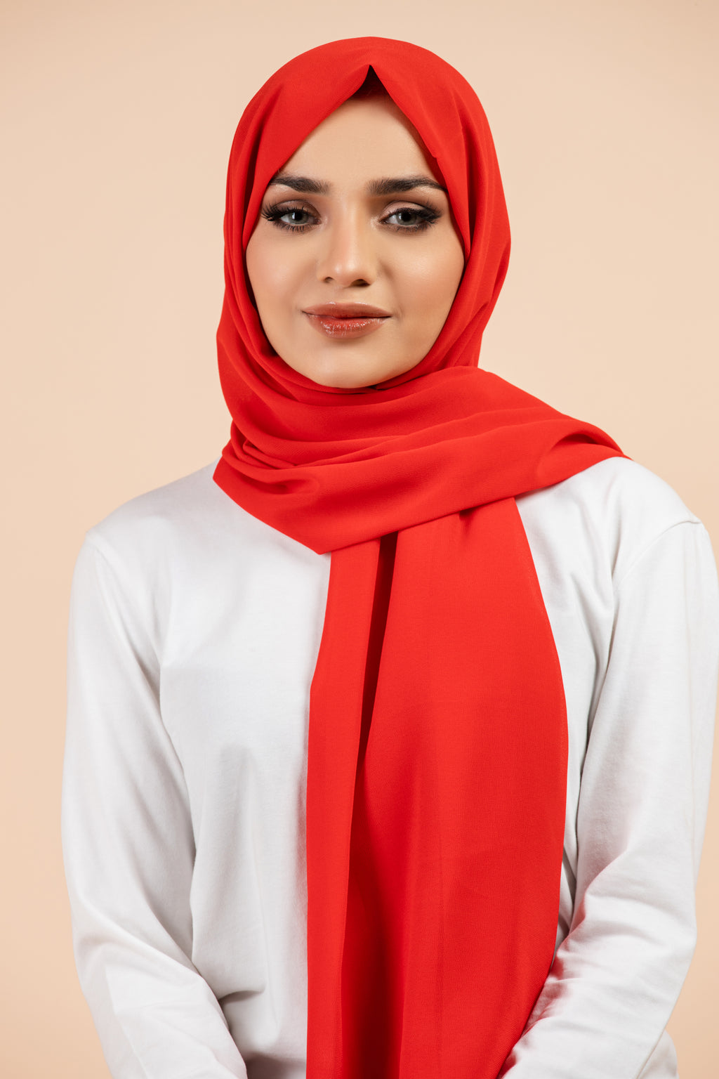 Premium Georgette - Russian Red Georgette Hijab worn by model, lightweight and flowy drape.