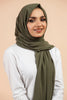 Premium Georgette - Sage Georgette Hijab worn by model, lightweight and flowy drape.