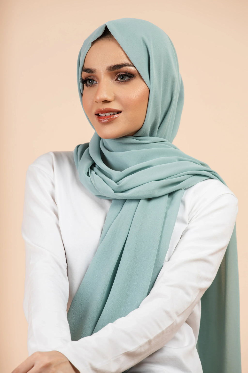 Premium Georgette - Seafoam Georgette Hijab worn by model, lightweight and flowy drape.